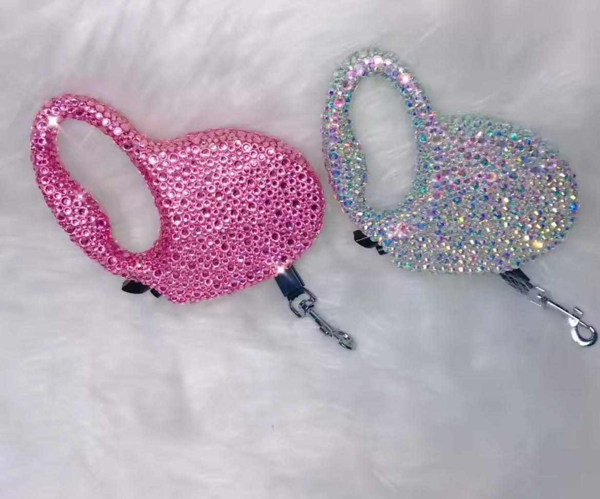 Heart-shaped rhinestone retractable dog leash retractor, pink and iridescent blue