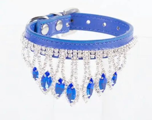 Blue rhinestone dog collar with sparkling fringe and crown-style stones, adjustable buckle