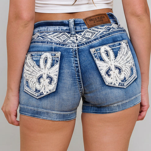 Women’s blue denim shorts with two rhinestone embroidered fleur-de-lis back pocket patches