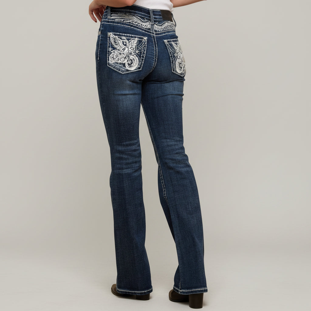Women's dark wash bootcut jeans with high waist, embellished back pocket, and flared hem