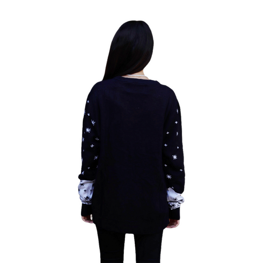 Dark navy sweater back with elf motif, snowflakes, and ribbed cuffs