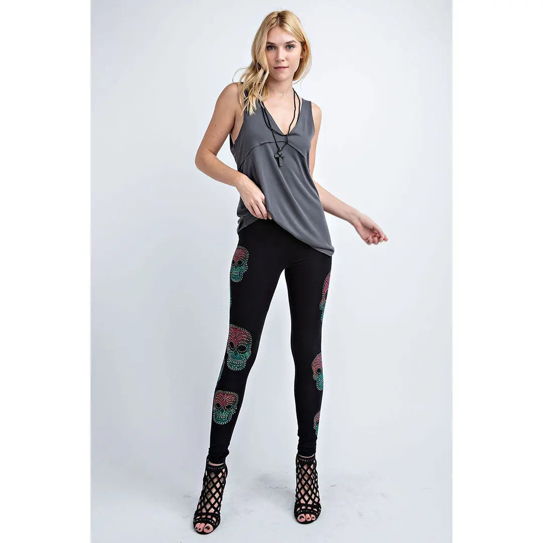 Black sugar skull leggings with teal and pink full-leg skull print
