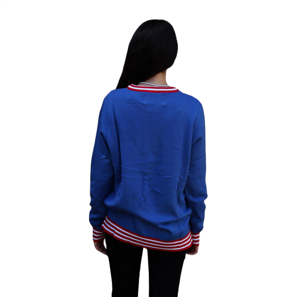Blue crewneck sweater back view with red-and-white striped ribbed hem and cuffs