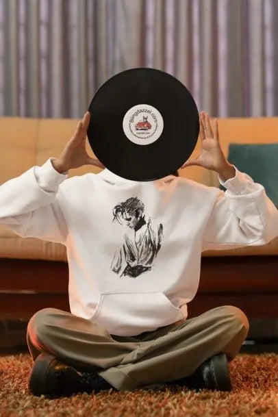 White crewneck sweatshirt with black portrait graphic, front view