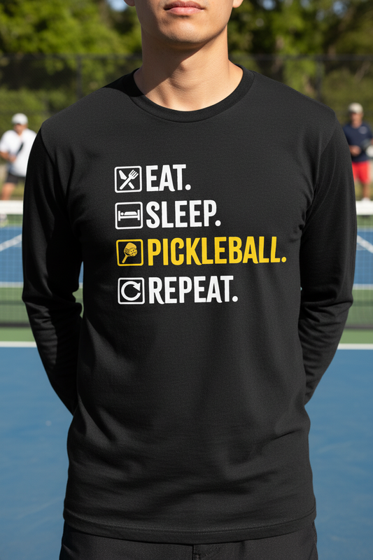 Black long-sleeve t-shirt with rhinestone-style pickleball slogan: Eat Sleep Pickleball Repeat