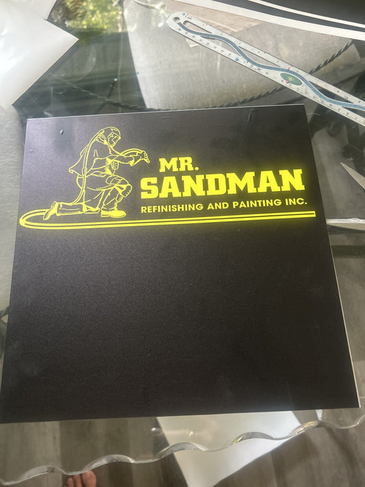 Black custom sign with yellow Mr. Sandman logo and Refinishing and Painting Inc.