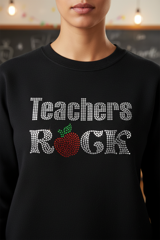 Black T-shirt with rhinestone 'Teachers Rock' letters and apple accents