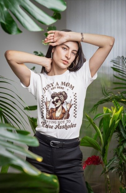 White graphic T-shirt with bear mom slogan and decorative border