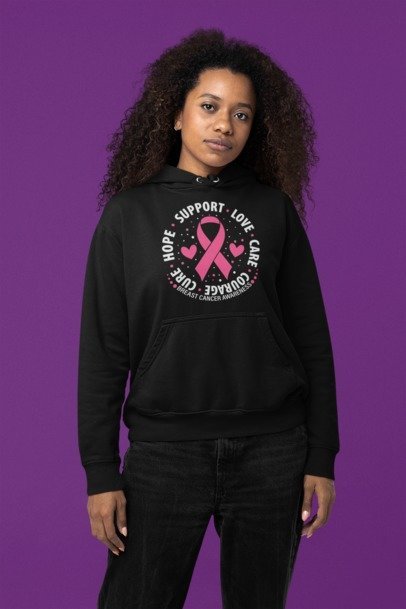 Black hoodie with pink breast cancer ribbon and circular awareness slogan graphic on chest