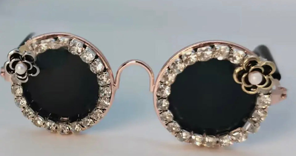Rhinestone pet sunglasses with round-oval black lenses and gold-tone decorative frames