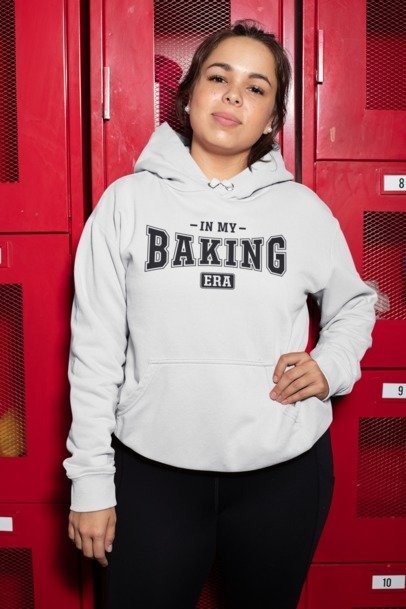 Light gray hoodie with "In My Baking Era" baker text graphic on front