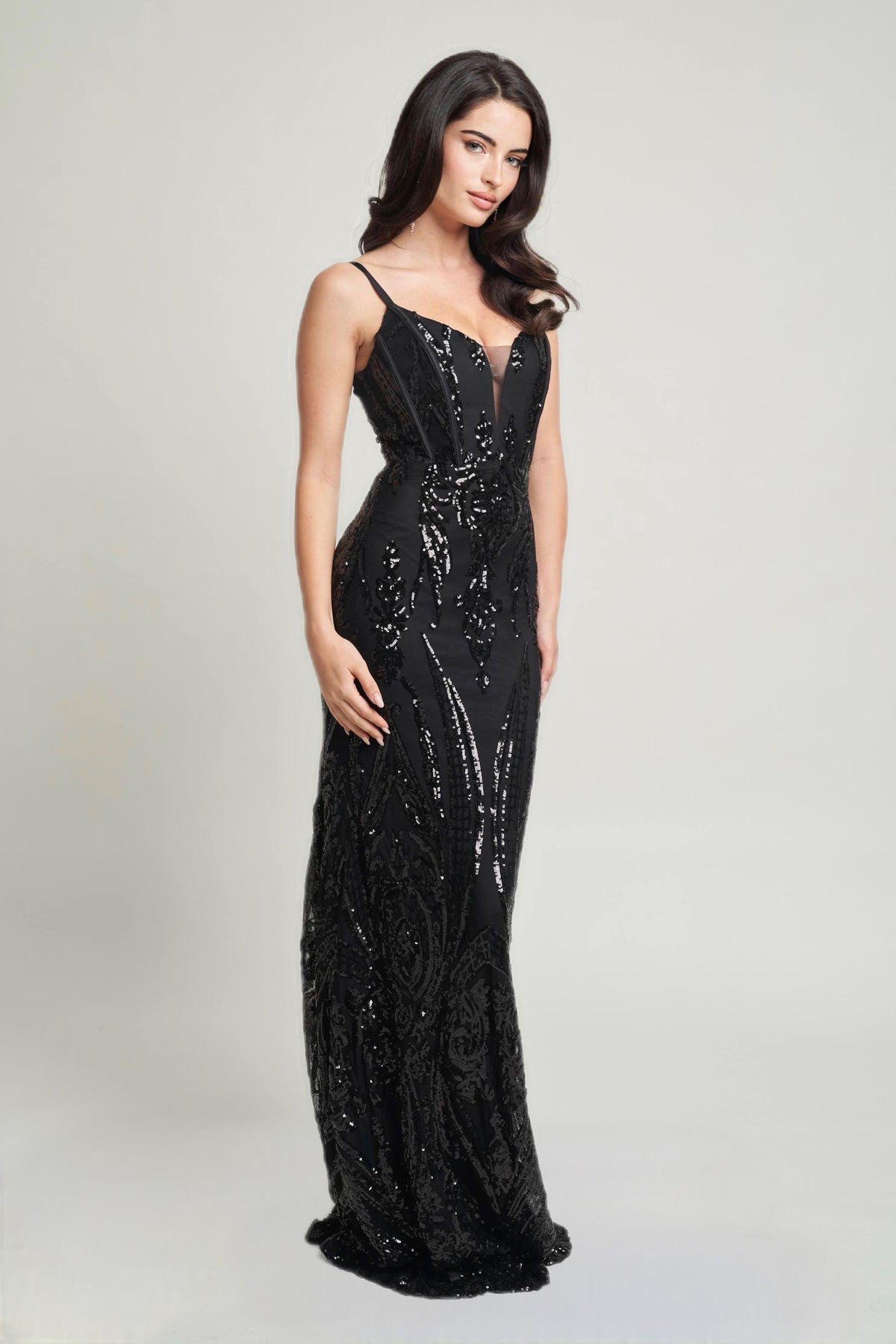 Black sequin maxi dress with spaghetti straps and deep V-neck, floor-length gown