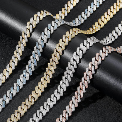 Multiple cuban link chain necklaces in gold and silver with cubic zircon stones