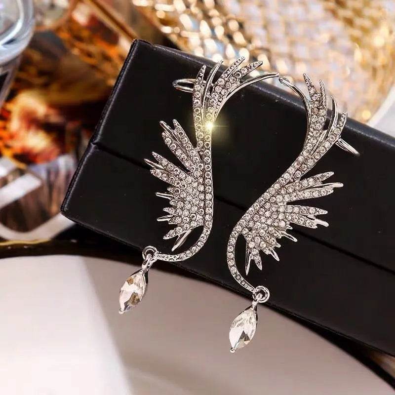 Silver angel wing ear bone clip earrings with crystal accents and teardrop charms