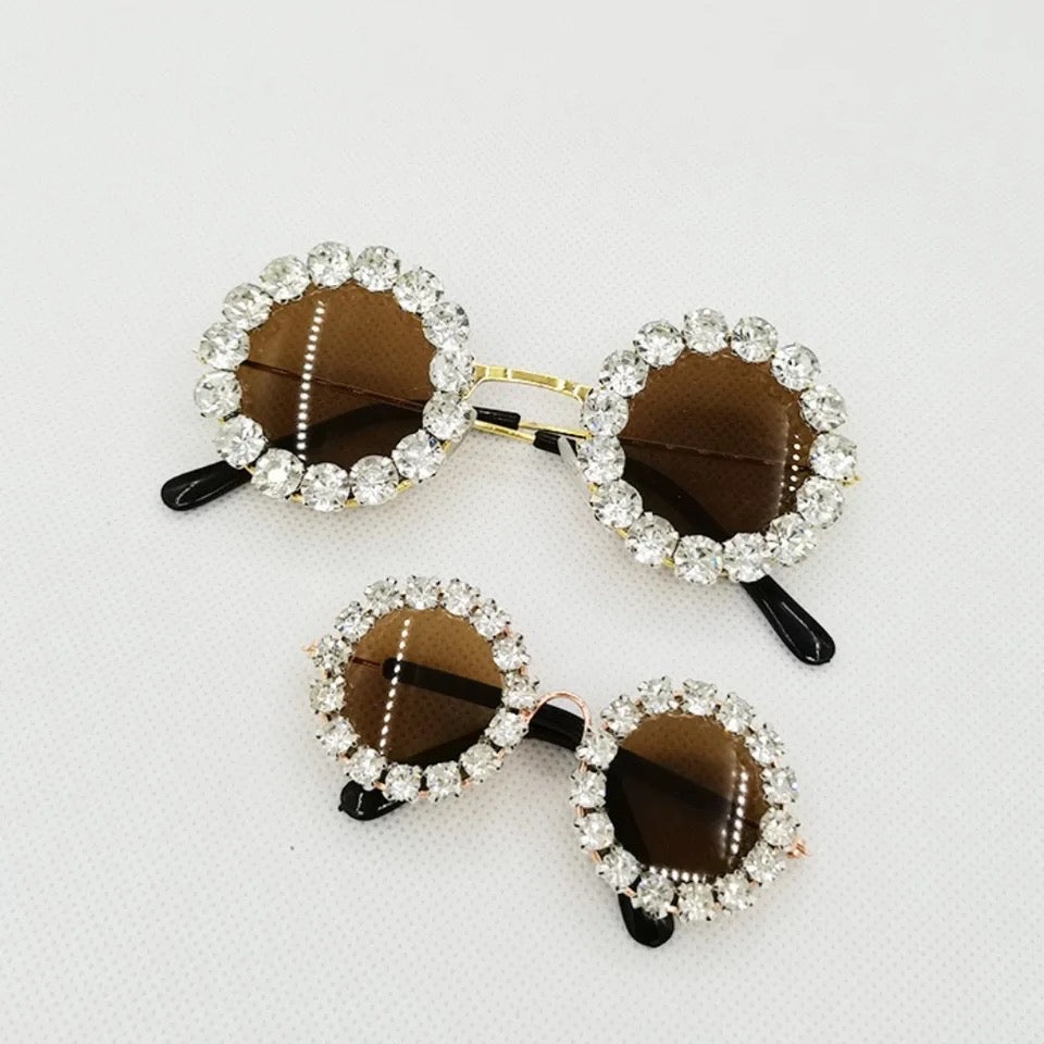 Silver rhinestone pet sunglasses with oval brown tinted lenses and black temple tips