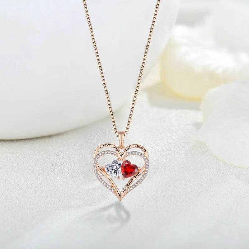 Double heart pendant necklace with red crystal and clear rhinestone border, long chain