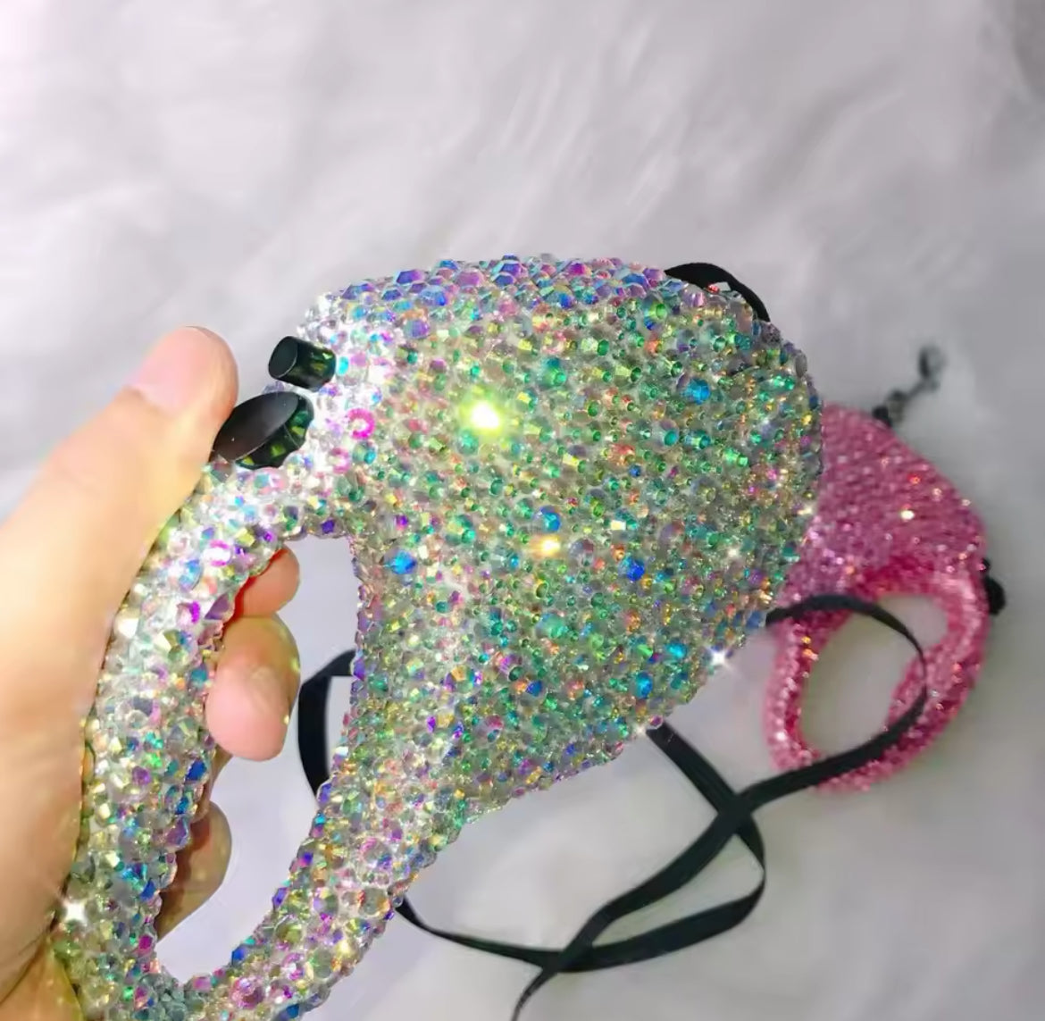 Iridescent rhinestone retractable dog leash retractor with black cord and clips