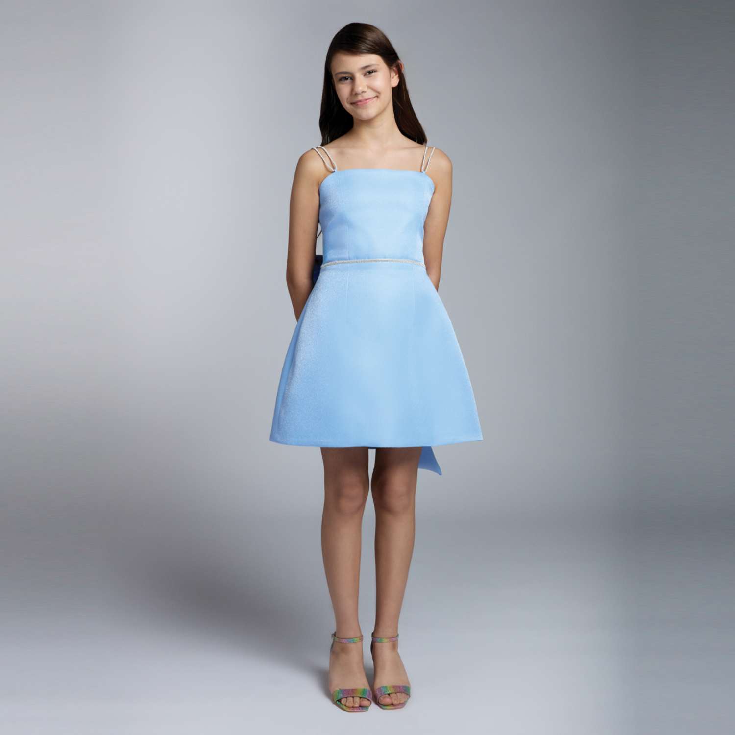 Blue girls formal dress with spaghetti straps and flared A-line skirt