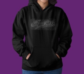 Black hoodie with 'America' text design on a purple background