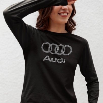 Person wearing a black long-sleeve shirt with Audi logo