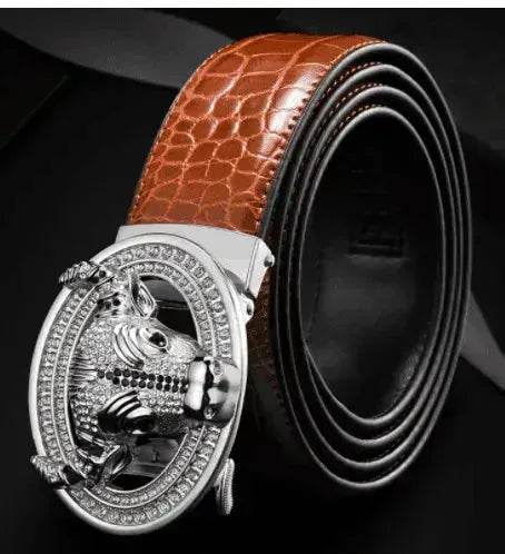 Silver-tone diamond-studded bull head automatic buckle on dark brown leather belt