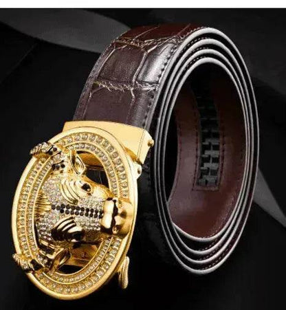 Gold-tone diamond-studded bull head automatic buckle on dark brown leather belt