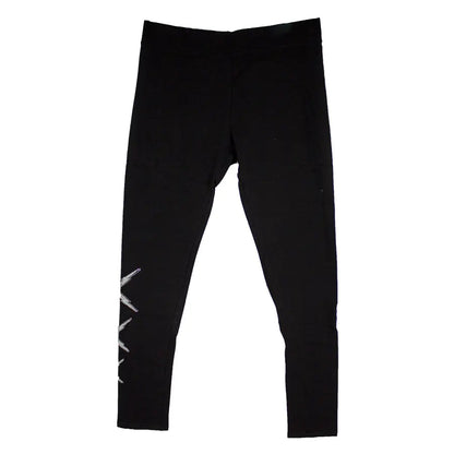 Black rhinestone skull leggings, partial view of skull and crossbones at hem