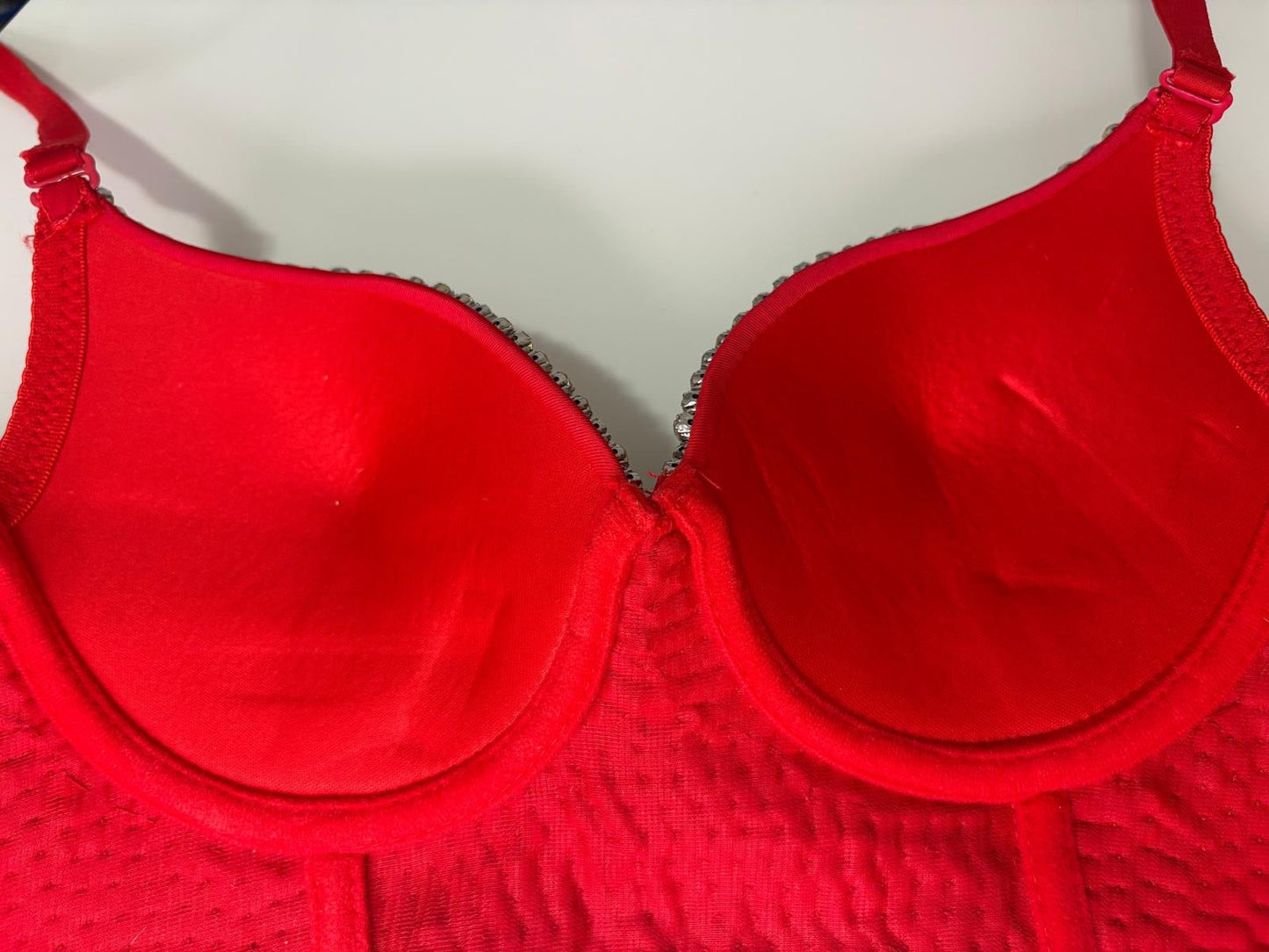 Red underwire bra top with scalloped trim and wired cups