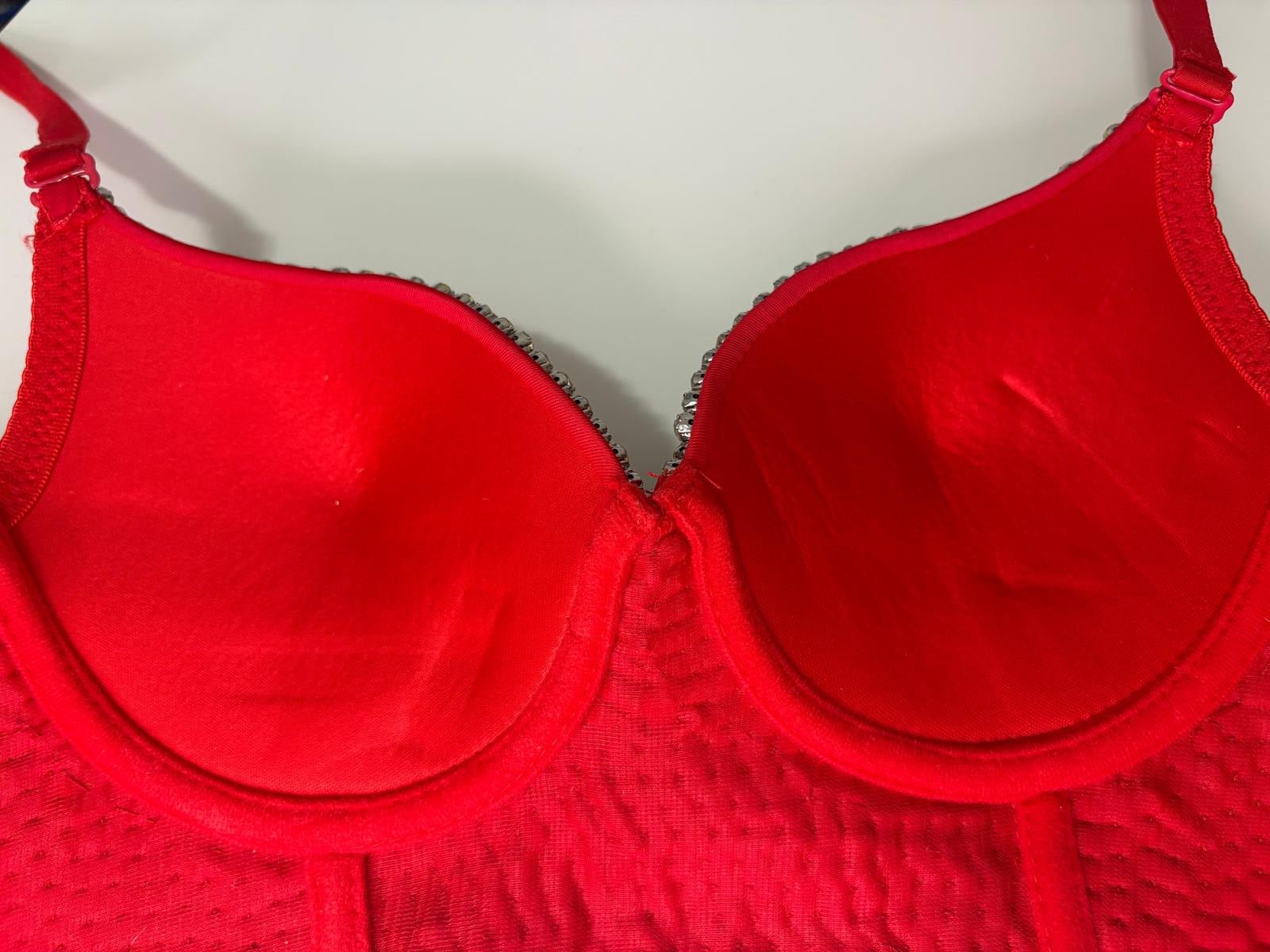 Red underwire bra top with scalloped trim and wired cups