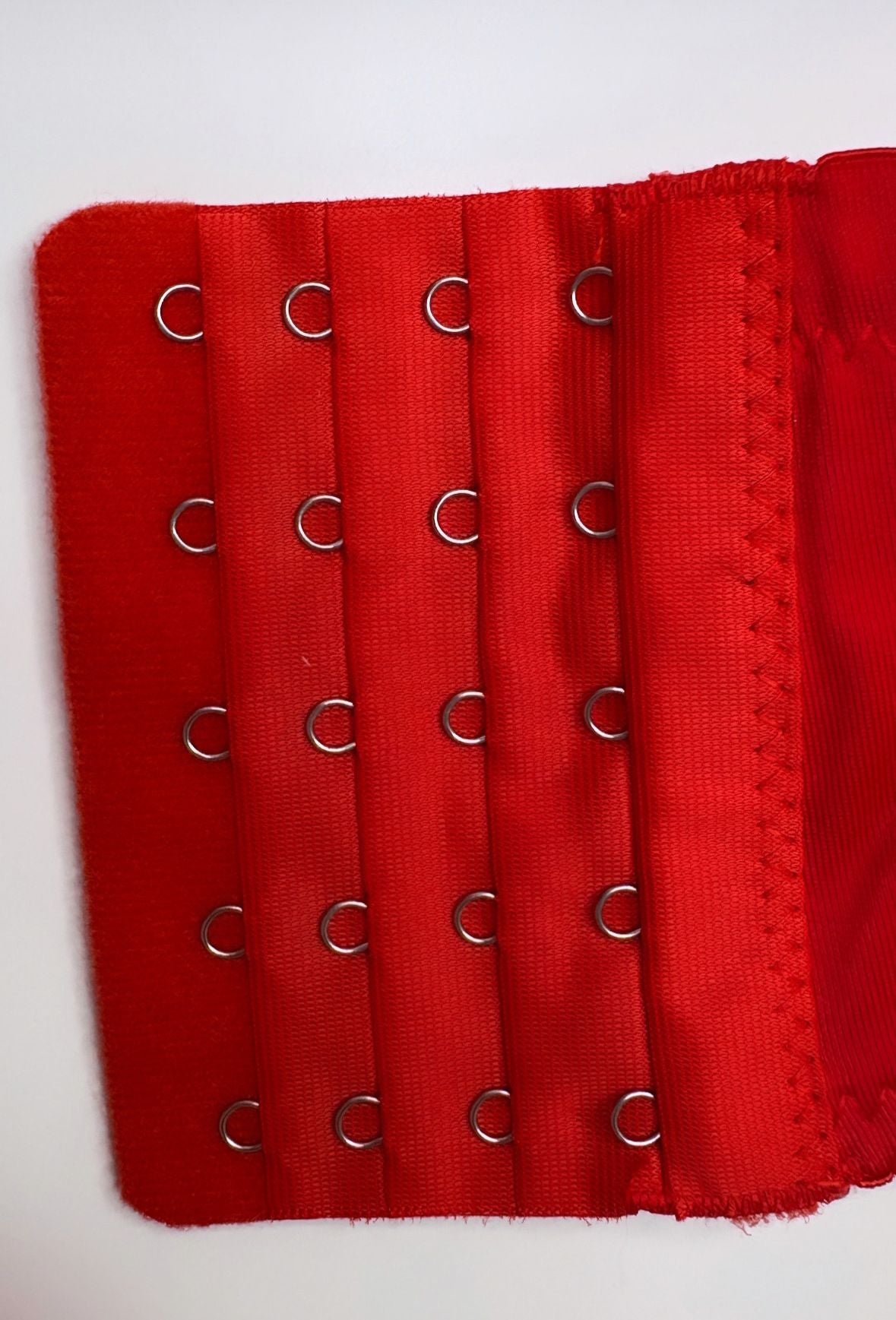 Red top band with silver ring eyelets