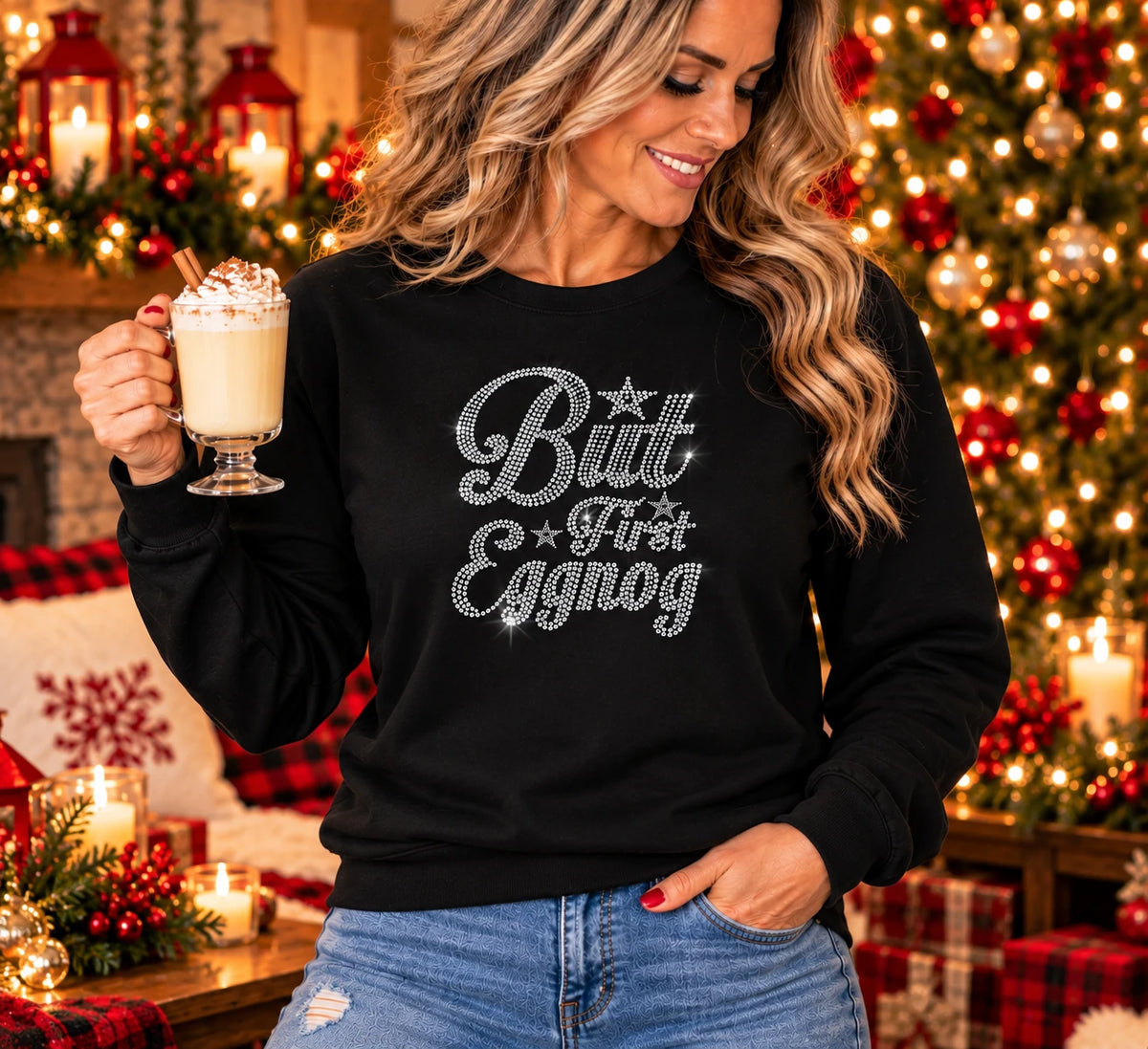 Black crew neck sweater with silver rhinestone “But First Eggnog” lettering