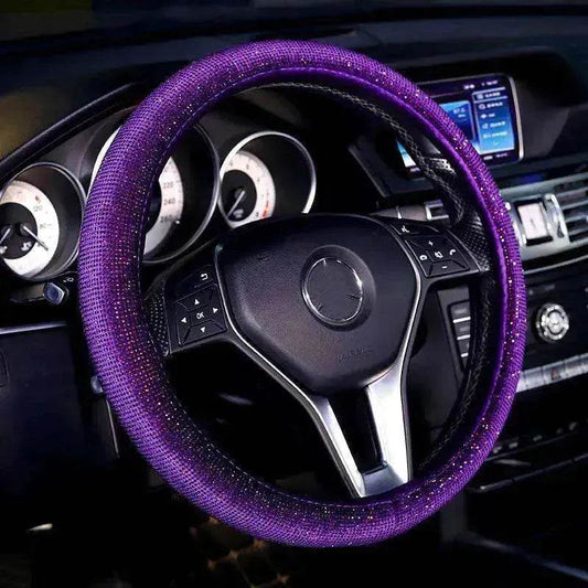 Purple glitter steering wheel cover with stitched edge, on a car wheel