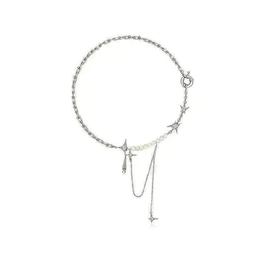 Silver layered star pendant necklace with central star and long dangling charm