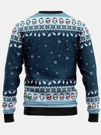 Boy navy penguin Christmas sweater back view with snowflake pattern and penguin border
