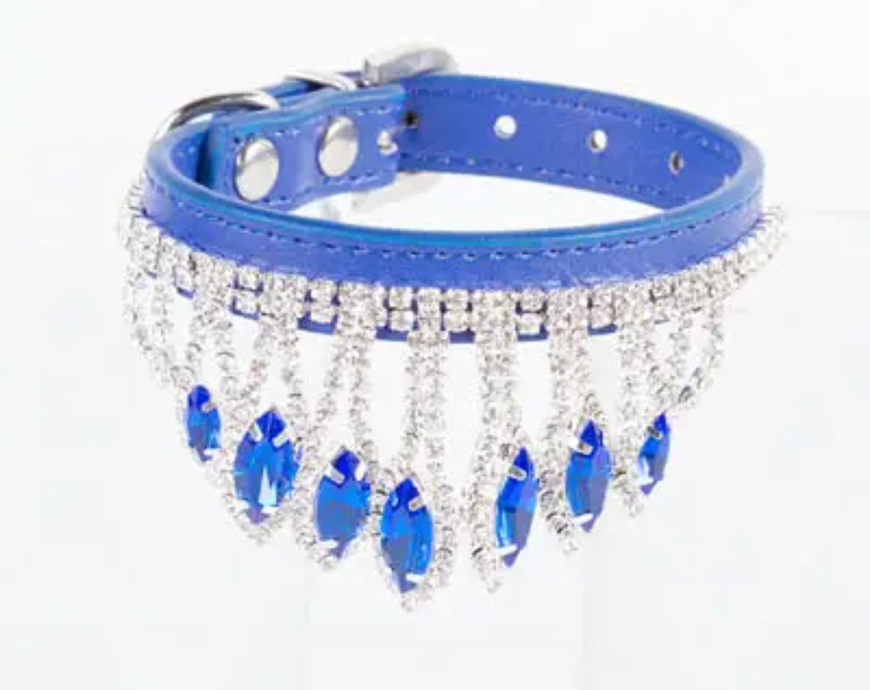Blue rhinestone dog collar with sparkling fringe and crown-style stones, adjustable buckle