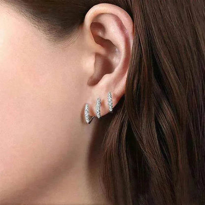 Diamond-inlaid stud hoop earrings with triple zigzag profile, silver-toned