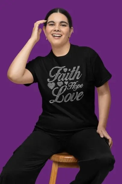 Person wearing a black t-shirt with 'Faith Hope Love' text on a purple background