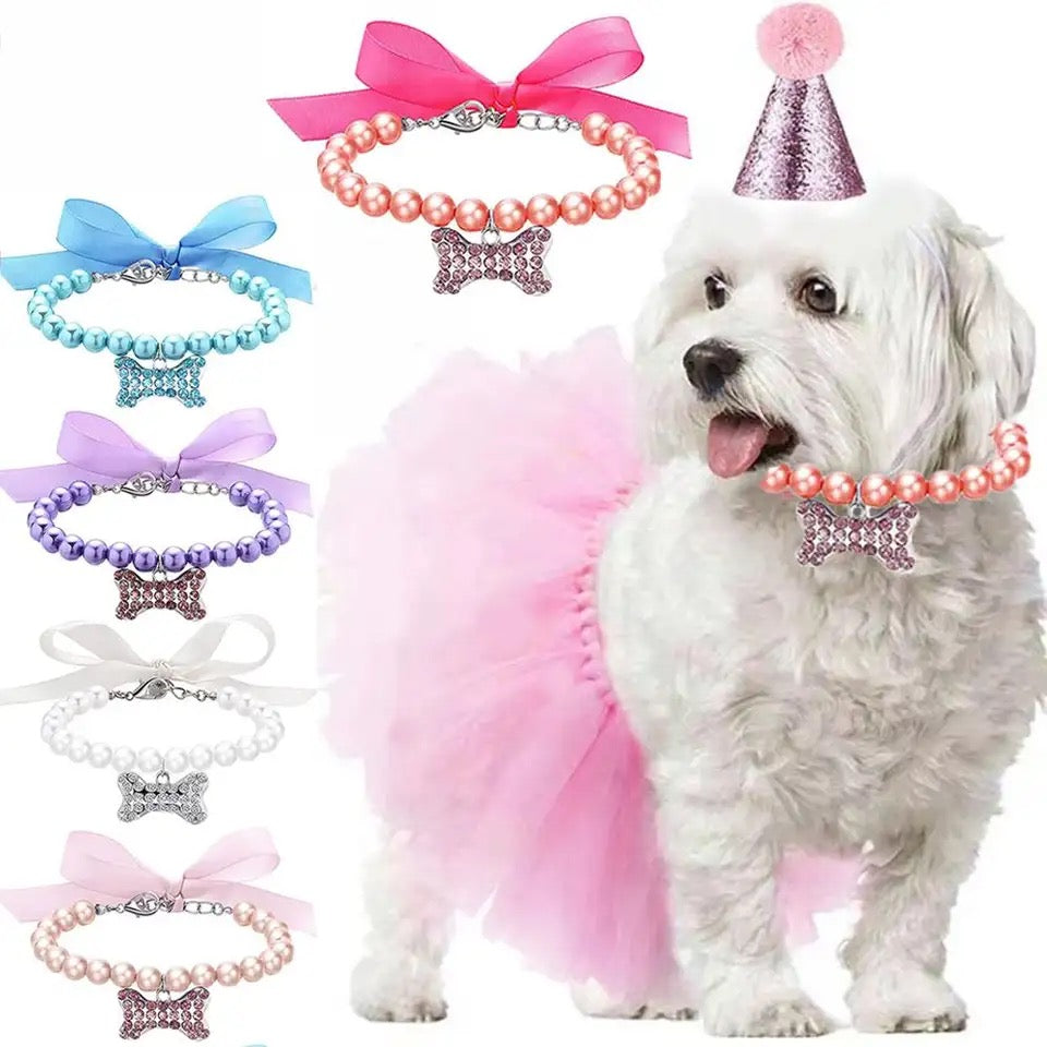 Pink pearl rhinestone dog collar with ribbon bow and dangling bone charm