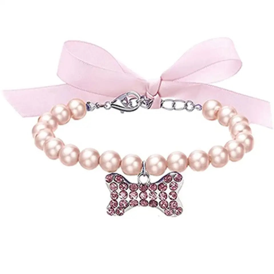Light pink pearl rhinestone dog collar with satin bow and bone charm