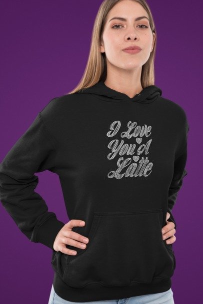 Person wearing a black hoodie with 'I Love You A Latte' text on a purple background
