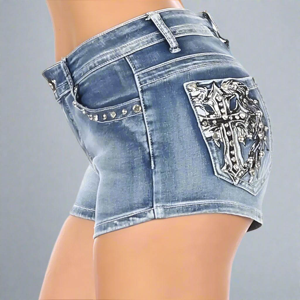 Women's blue denim shorts with rhinestone angel wing cross on back pocket