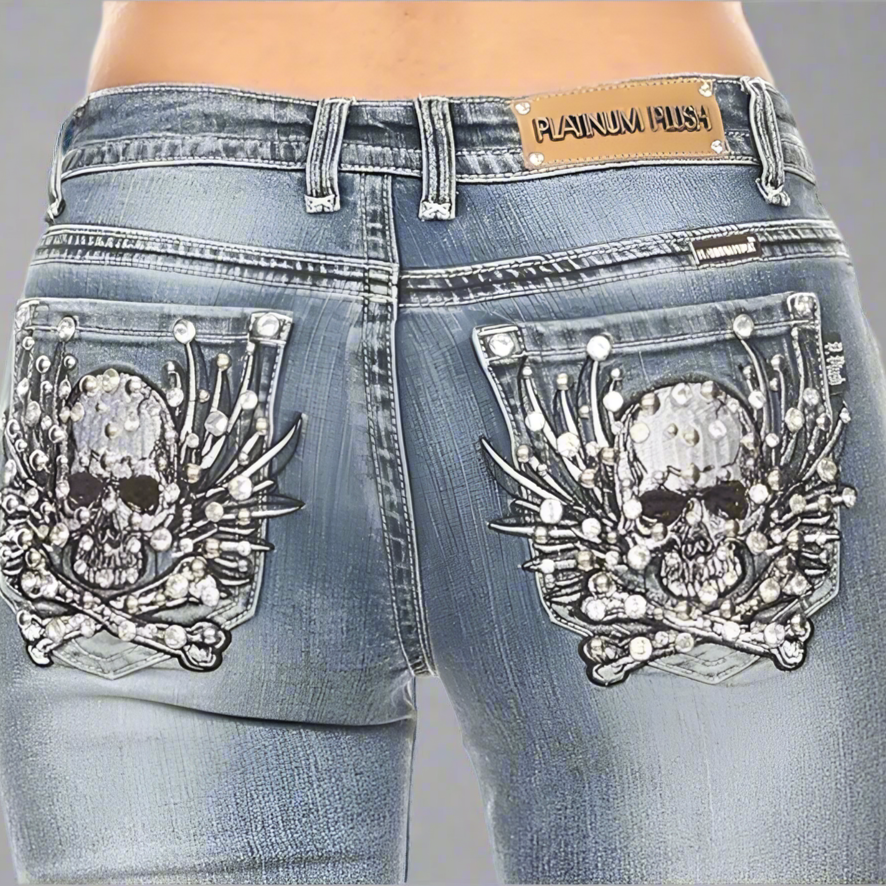 Platinum Plush women's jeans, back waistband label and rhinestone skull-and-bones pocket art
