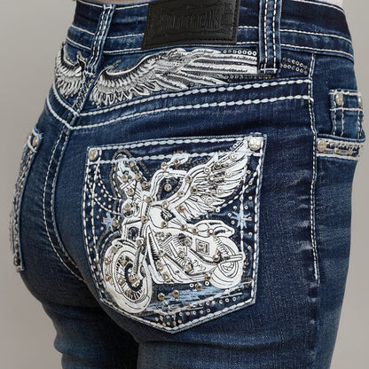 Dark wash bootcut jeans with ornate winged embroidery on back pocket and silver-tone studs