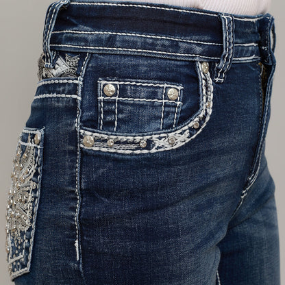Back pocket flap with silver-tone rhinestone guitar and music-note embroidery