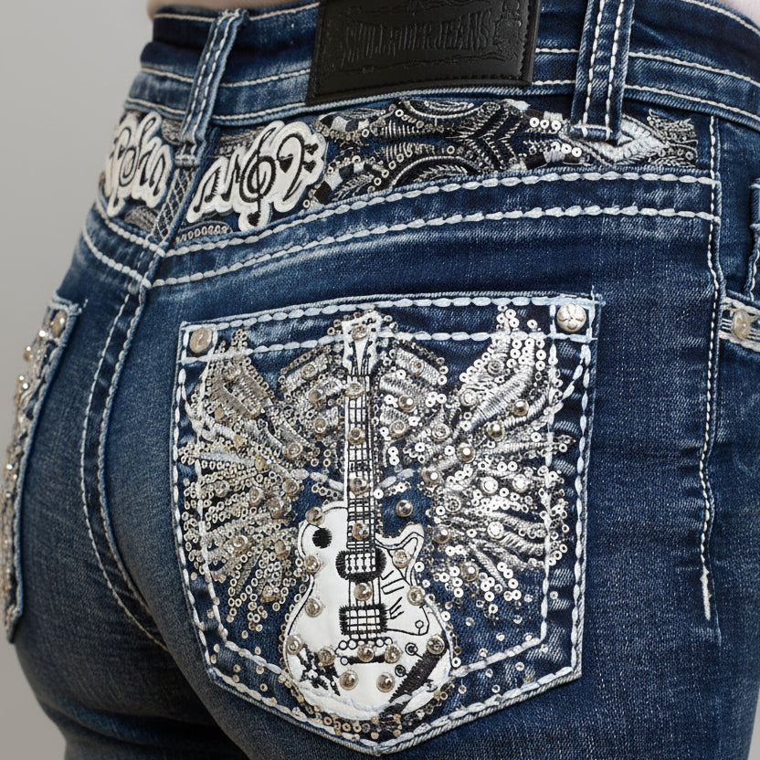 Front pocket with silver-tone sequined guitar graphic and snap-button flap
