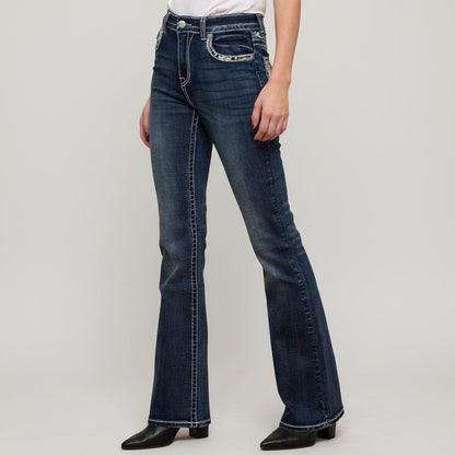Dark wash bootcut jeans with embellished back pocket and rhinestone guitar motif