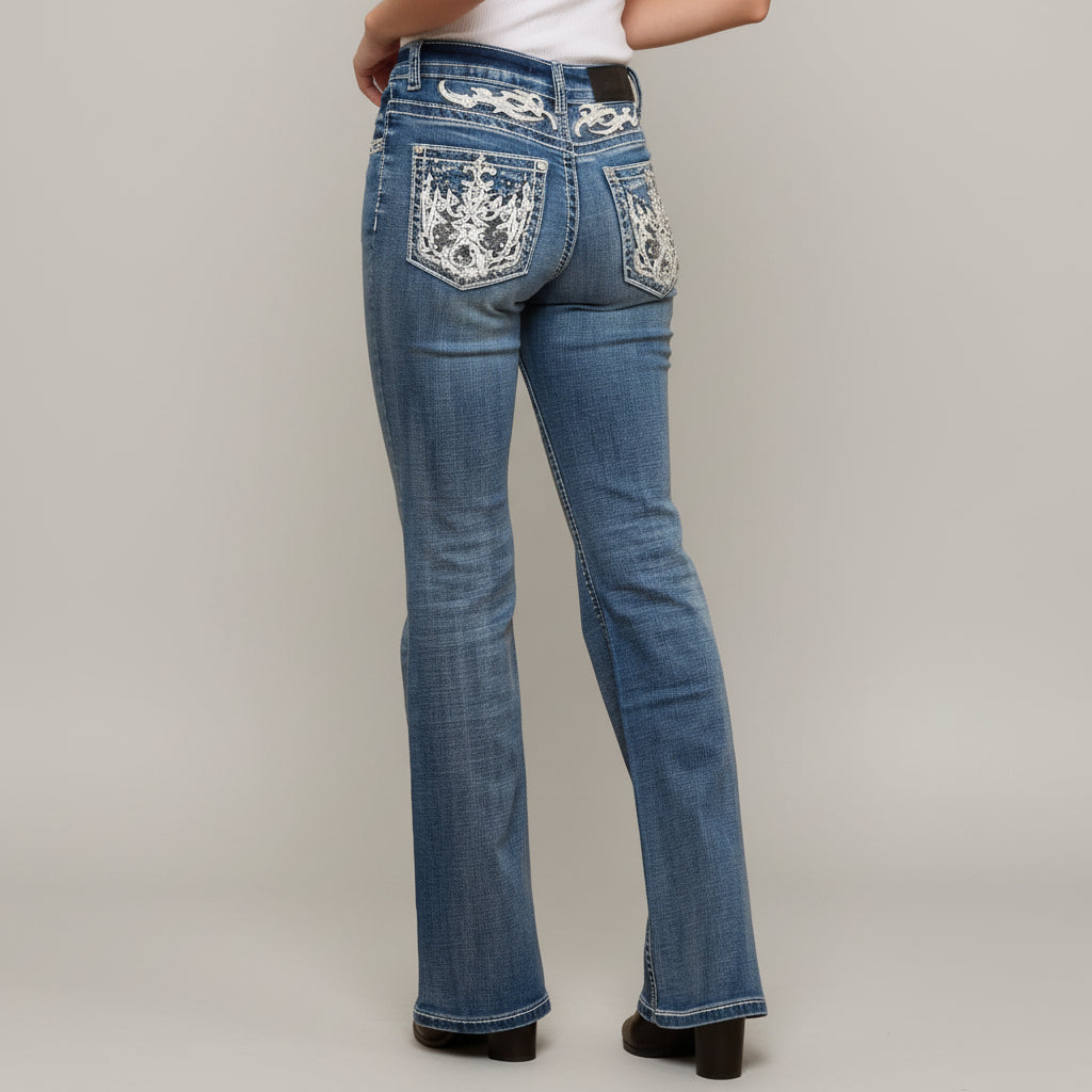 Women’s blue bootcut jeans with high waist and ornate embroidered back pockets