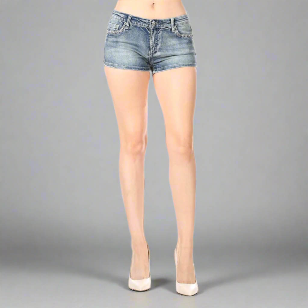 Women's blue denim shorts with rhinestone wing pocket detail and short inseam