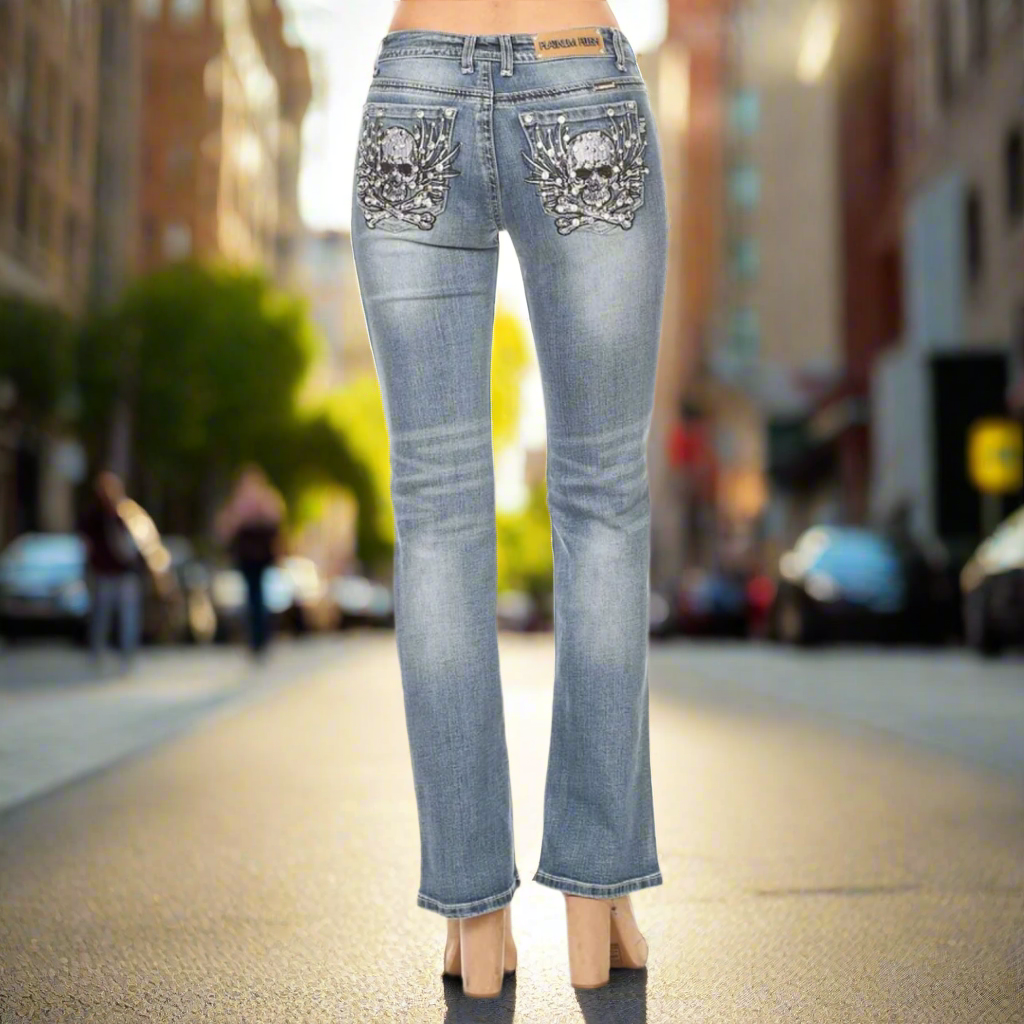 Platinum Plush women's bootcut jeans, rhinestone skull-and-bones on back pockets