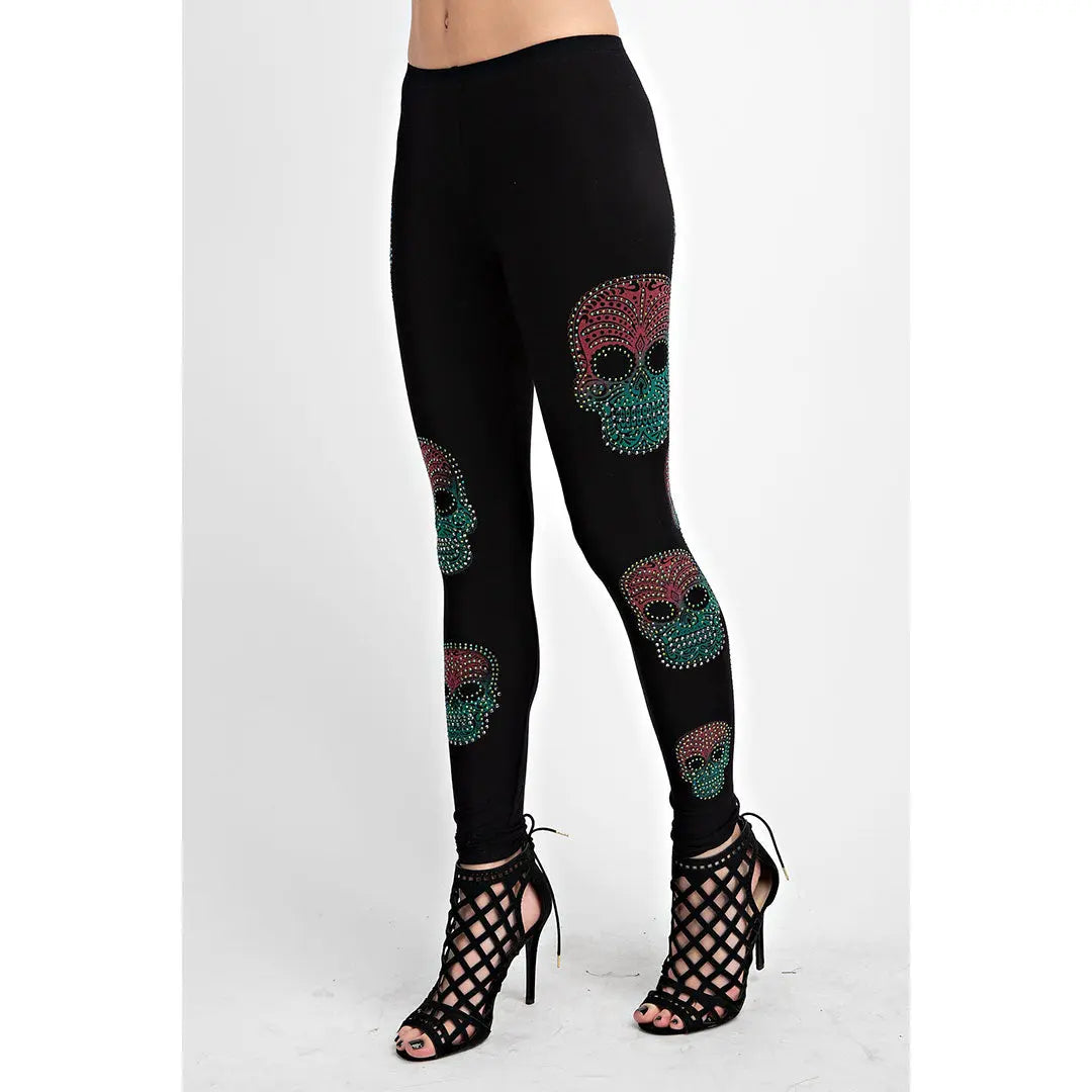 Black sugar skull leggings with teal and pink skull print on full legs